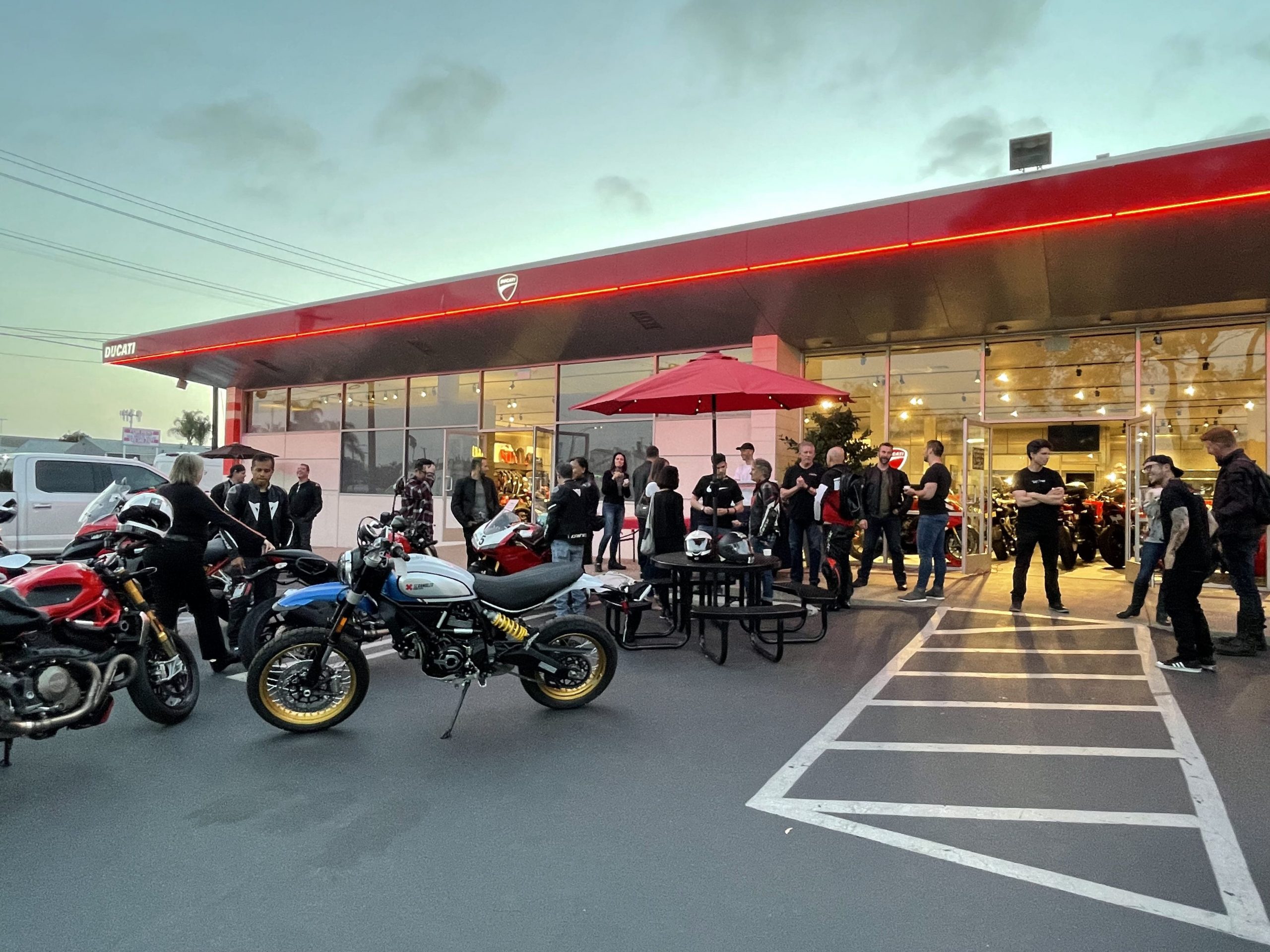 VIP Program 1 Ducati Scrambler and Multistrada gathering at Ducati dealership in Orange County during a bike night event