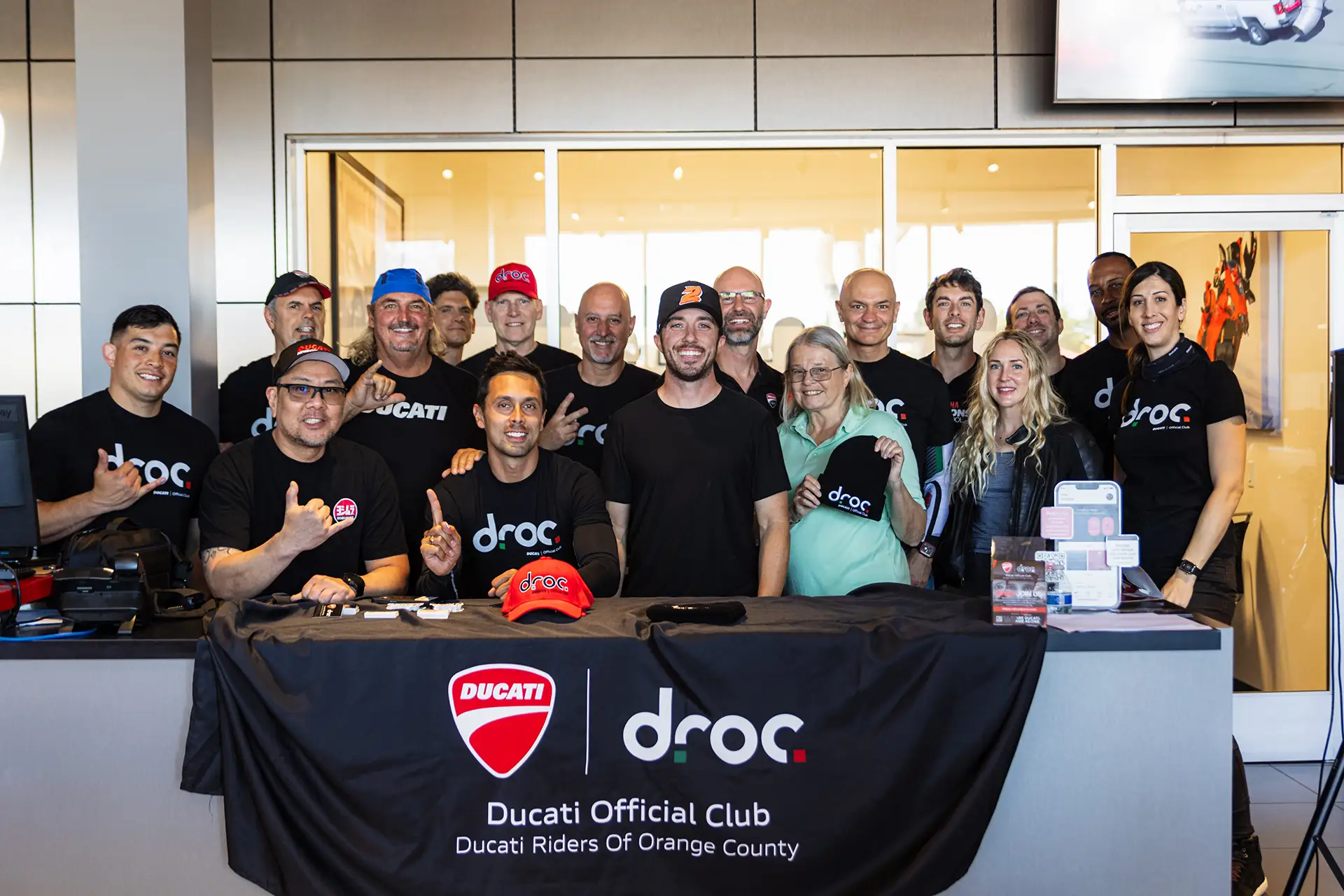 Ducati Riders of Orange County members at a club event showcasing community benefits and camaraderie