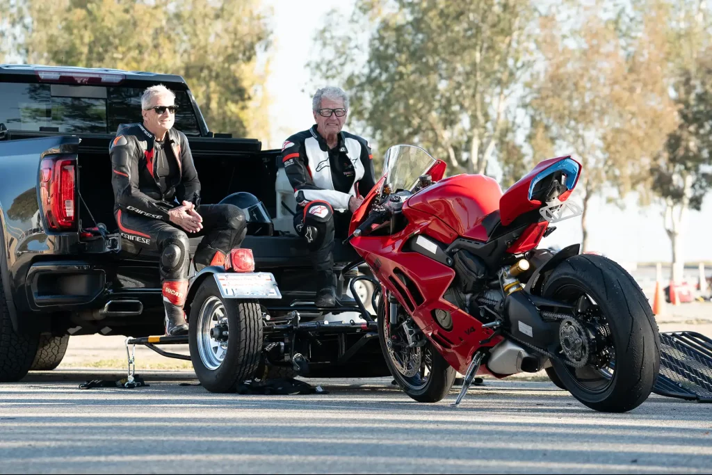 Ride with DROC: the six ways we ride 11 Ducati Panigale parked near riders in gear, enjoying benefits of DROC membership in Orange County