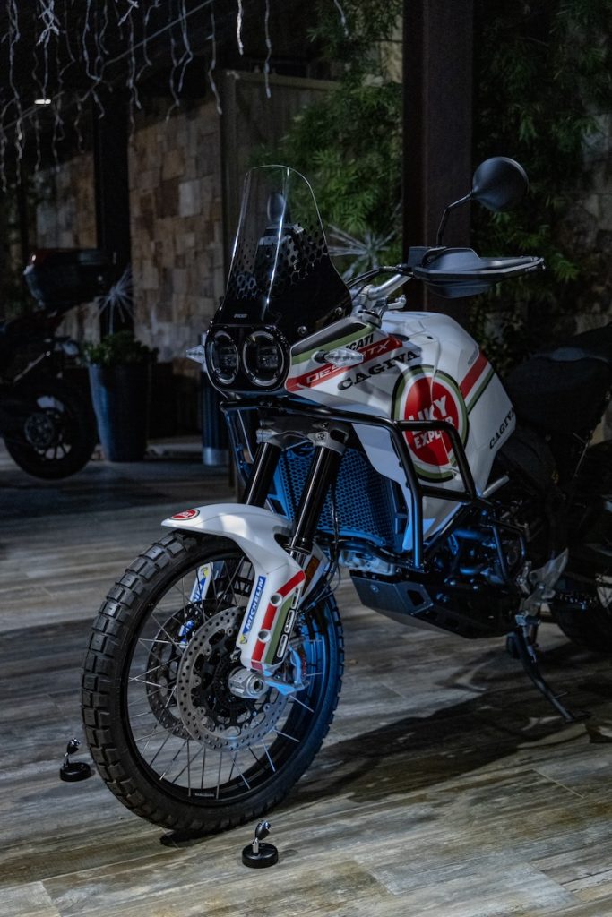 Ducati DesertX motorcycle showcased indoors with stylish decor in Orange County