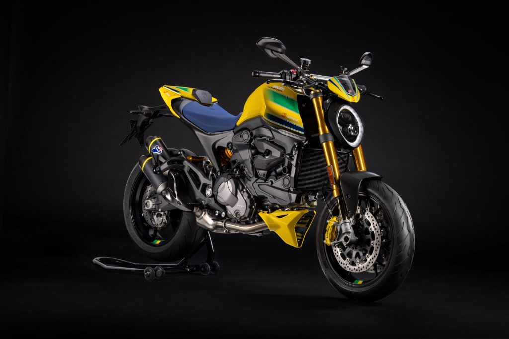 Ducati Monster Senna in striking yellow and blue with sleek design against a dark background