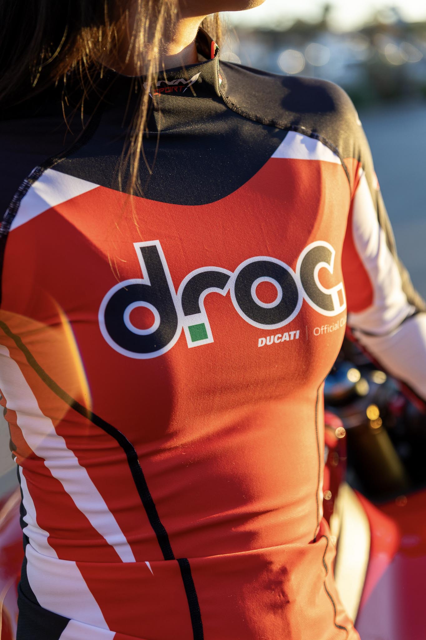 DROC club member wearing Ducati compression shirt displaying motorcycle passion