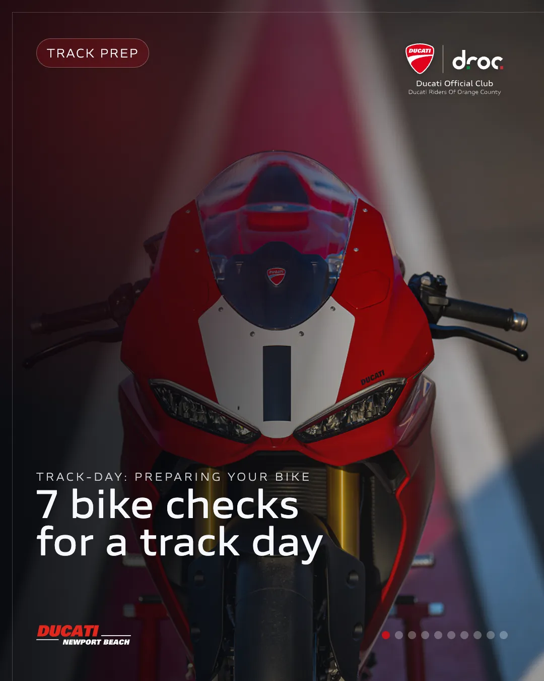 Ducati sportbike ready for track day preparations with focused view of front and headlights