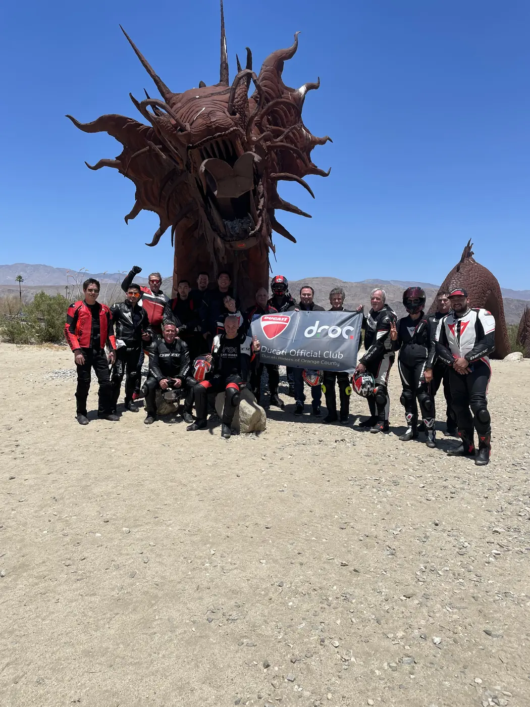 DROC members and Ducatis at the serpent sculpture in Borrego Springs