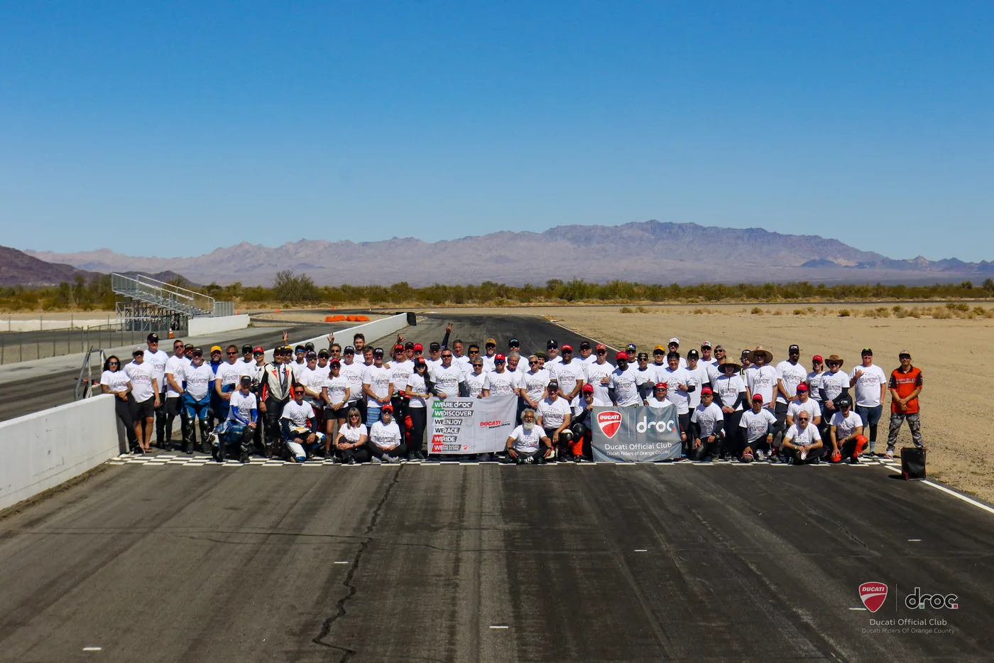 The full DROC club gathered across the front straight at a Ducati track day, March 2025