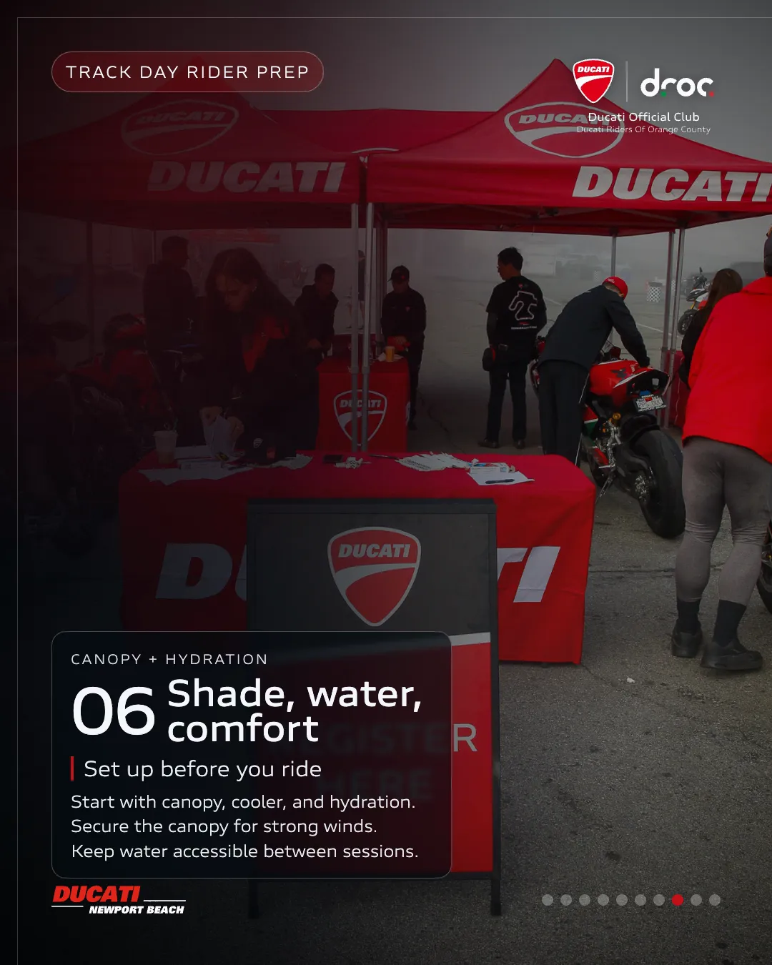Ducati track day prep with canopy, hydration station, and riders in gear at an event in Newport Beach