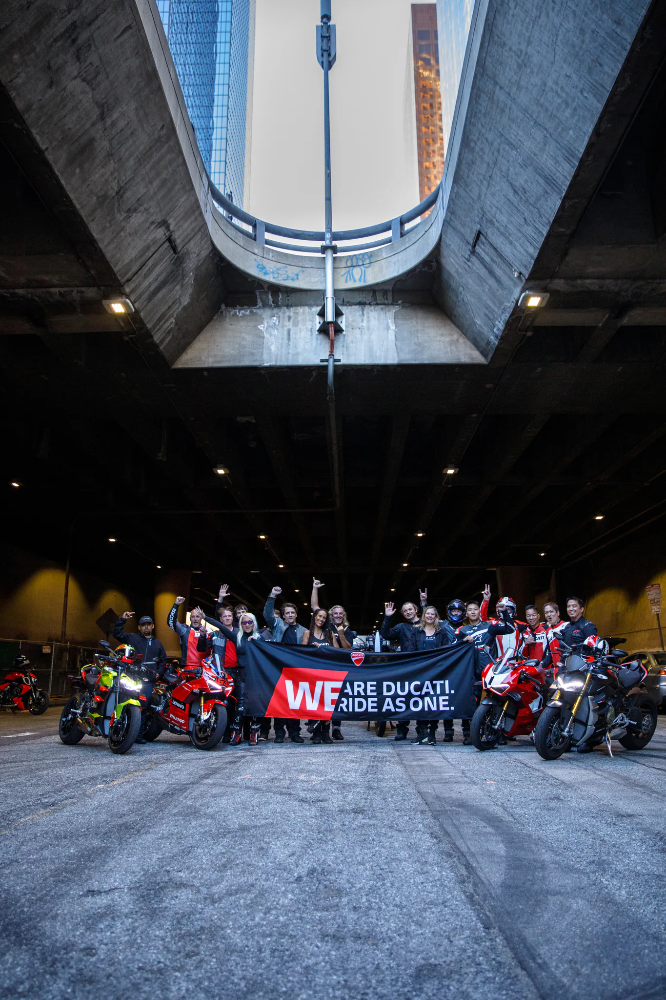 6th Street Viaduct and DTLA rides 5 DROC riders and their Ducatis gathered in the Lower Grand service tunnels under Bunker Hill in downtown Los Angeles, holding a We Are Ducati Ride As One banner