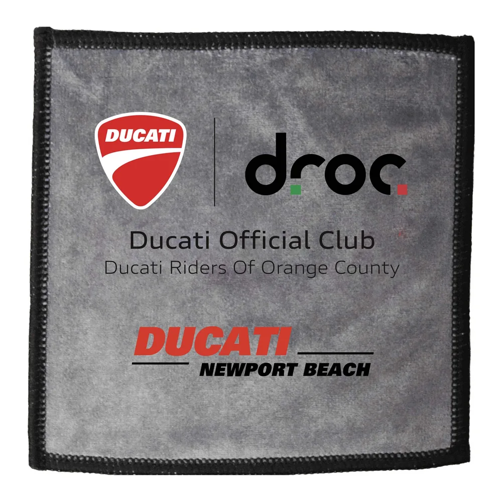 Gray microfiber towel with a black stitched edge, printed with the Ducati shield, the droc logo, Ducati Official Club, Ducati Riders Of Orange County, and the Ducati Newport Beach logo